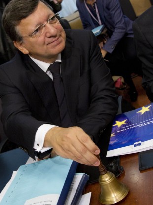 European Commission President Jose Manuel Barroso rings the bell to start the meeting in Brussels