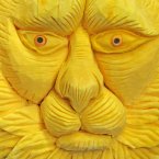 A carved pumpkin sculpture featuring a lion's face at the International Exhibition of Culinary Art (IKA) also known as the Culinary Olympics IKA in Erfurt, central Germany. About 1,600 chefs and pastry chefs and their support teams from 50 countries transform the fairgrounds into a platform of finest culinary art from the 5th to the 10th of Oct. 2012. (AP Photo/Jens Meyer)
