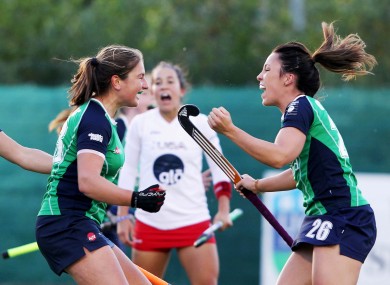 Ireland's Niamh Atcheler celebrates with Anna O'Flanagan after scoring the first goal in their side's 3-2 defeat against the USA.