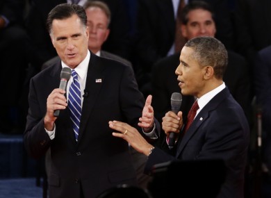 President Barack Obama and Republican presidential candidate and former Massachusetts Gov. Mitt Romney participate in the second presidential debate