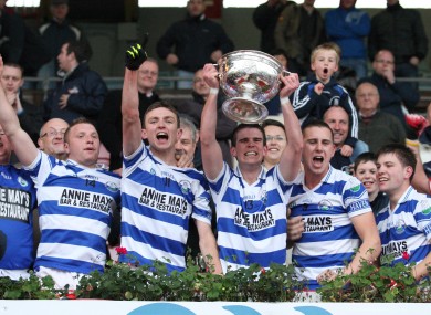 Castlehaven captain Seanie Cahalane lifts the trophy.