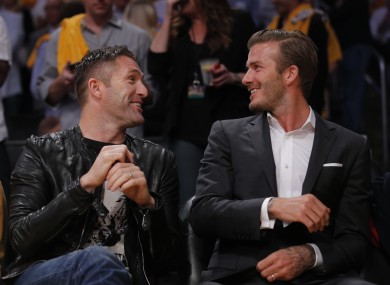 Los Angeles Galaxy's Robbie Keane, left, and David Beckham at the Lakers-Mavs game this week.