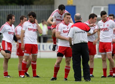 Tyrone boss Mickey Harte with his players.