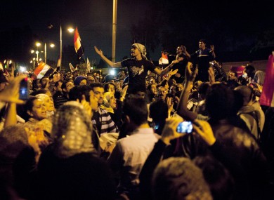 Egyptian protesters chant anti Muslim Brotherhood slogans during a demonstration in front of the presidential palace in Cairo, Egypt