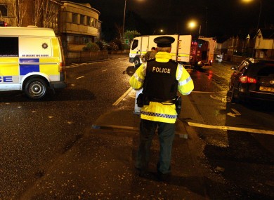 The scene last night, as police sealed off Upper Newtownards Road.
