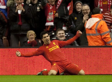 Liverpool's Luis Suarez celebrates after scoring against Sunderland during their English Premier League soccer match at Anfield.