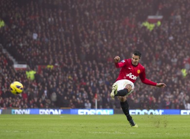 Manchester United's Robin van Persie takes a free kick against Liverpool.