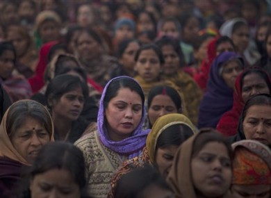 Indian women offer prayers for the gang rape victim.