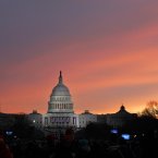 The sun rises over Capitol Hill in Washington, Monday, Jan. 21, 2013, before the start of President Barack Obama's ceremonial swearing-in ceremony during the 57th Presidential Inauguration. (AP Photo/Jose Luis Magana)