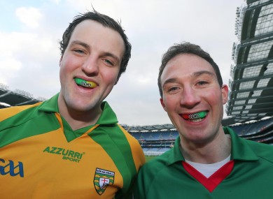 Donegal's Michael Murphy and Alan Dillon of Mayo.
