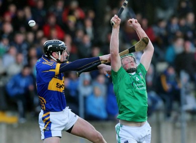 Tipperary's Paul Curran and Shane Dowling of Limerick.
