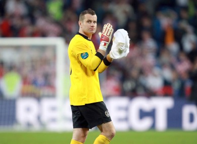A dejected Shay Given applauds the Irish supporters in Poznan.
