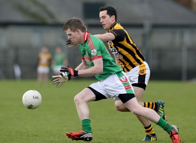 Crossmaglen's Aaron Kernan and Darren Dolan of St Brigid's
