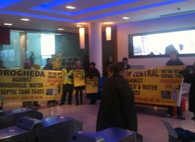 CAHWT protesting in PWC's lobby this afternoon.