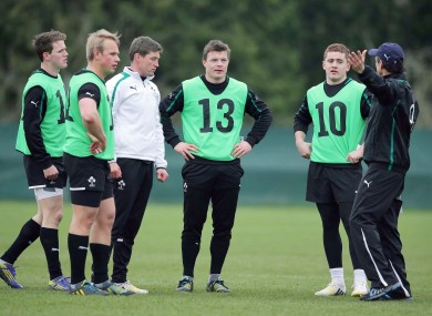 Craig Gilroy, Luke Marshall, Ronan O'Gara, Brian O'Driscoll and Paddy Jackson listen to Les Kiss.