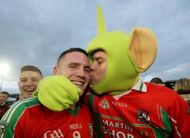 Ballymun's Davey Byrne celebrates with fan Darragh Joyce.