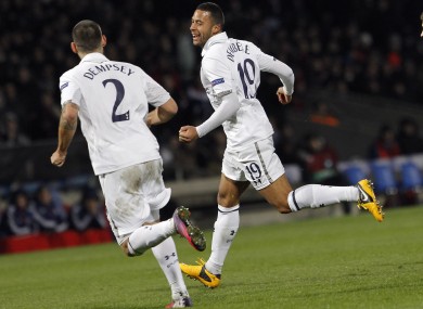 Mousa Dembele, center, celebrates with Clint Dempsey.