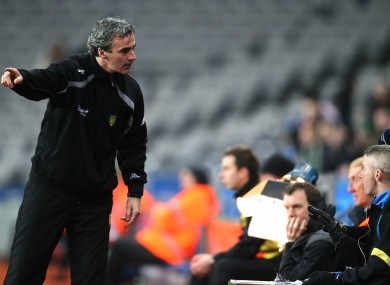 Donegal manager Jim McGuinness argues with the fourth official during final moments of the match.