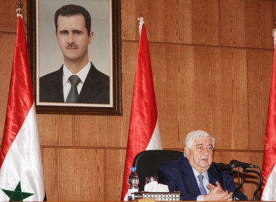 Syrian Foreign Minister Walid al-Moallem speaks at a press conference in Damascus, Syria, Monday, Dec. 19, 2011.