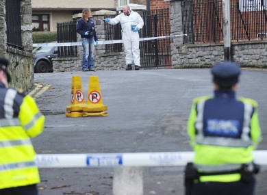 Gardaà and forensic teams investigate the shooting of Christopher Warren in the Broadstone area of Dublin
