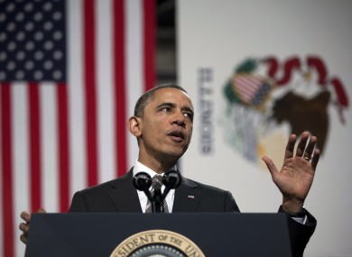 President Barack Obama gestures as he gives his State of the Union address.