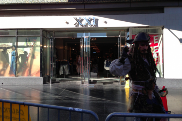 to-the-right-of-the-carpet-there-is-a-forever-21-clothing-store-and-johnny-depp-look-a-like-from-pirates-of-the-caribbean