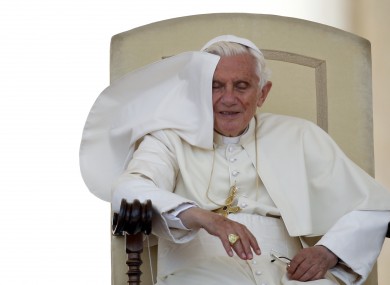 Here's one thing an ex-pope doesn't have to deal with: flyaway capes.