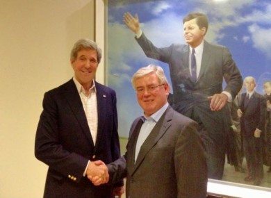 John Kerry and Eamon Gilmore shake hands at Shannon Airport earlier this month