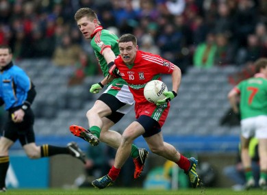 Ballymun Kickhams Davey Byrne and St Brigid's Darren Dolan in action.